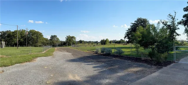 a view of a lake view with a big yard