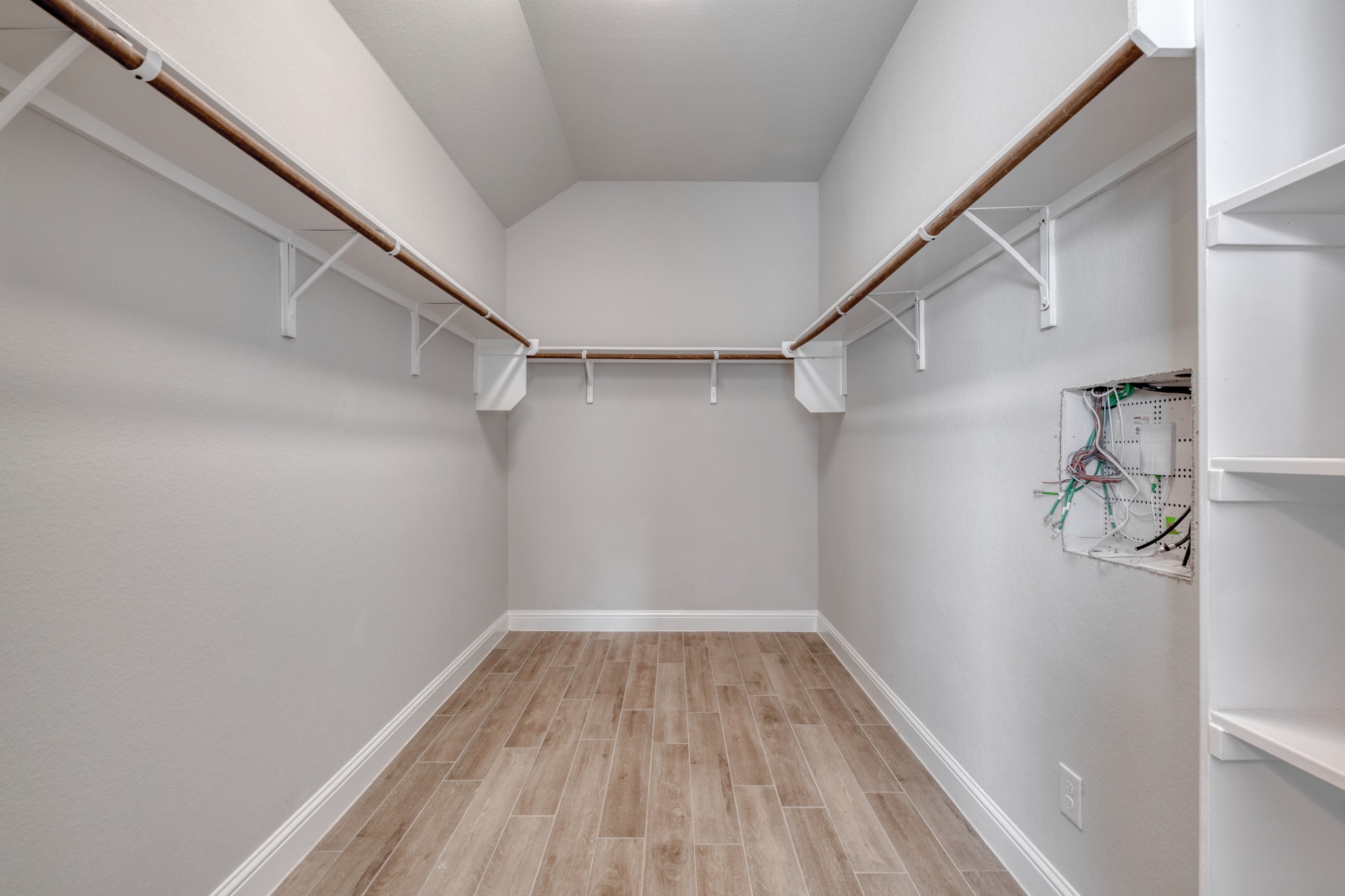 359 Raptor Beak Way Cedar Creek, TX 78612 - Photo 20 of 29 You will never run out of room in the walk-in closet, which offers more than enough hanging space for every season
