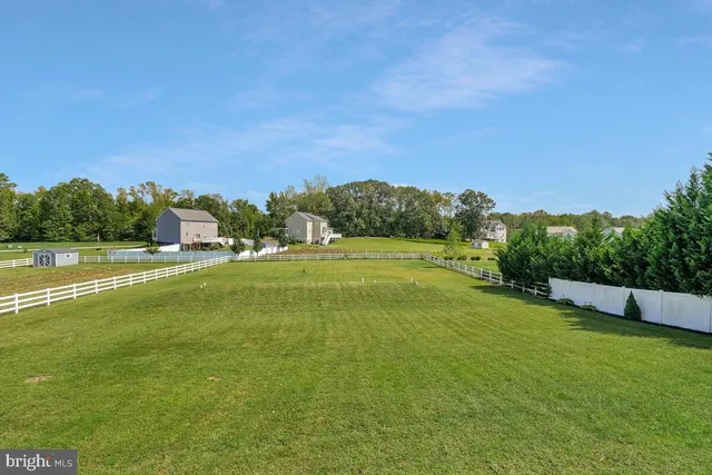 a view of a golf course with a lake