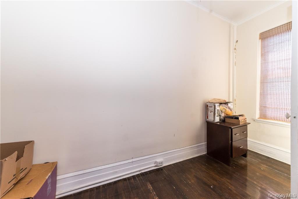 36 Echo Avenue, Unit 5C New Rochelle, NY 10801 - Photo 12 of 18 a view of a room with wooden floor