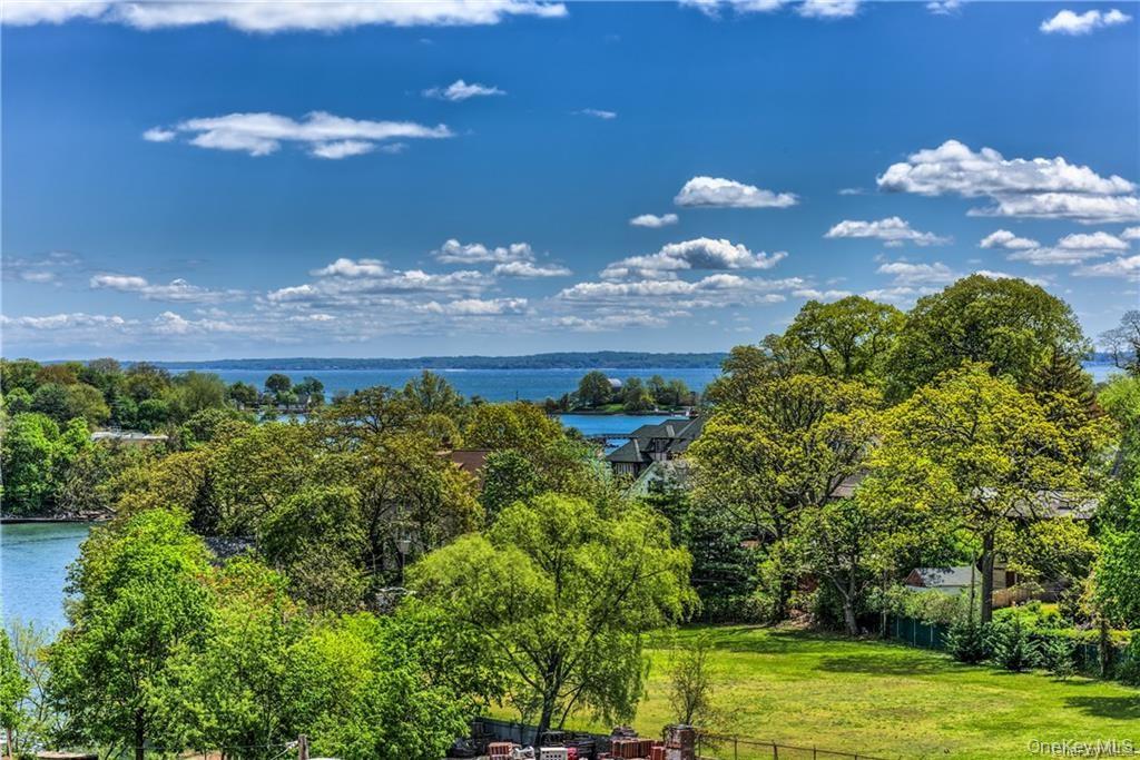 36 Echo Avenue, Unit 5C New Rochelle, NY 10801 - Photo 16 of 18 a view of a house with a big yard
