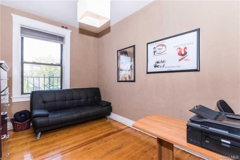 36 Echo Avenue, Unit 5C New Rochelle, NY 10801 - Photo 9 of 18 a bedroom with a bed and a couch