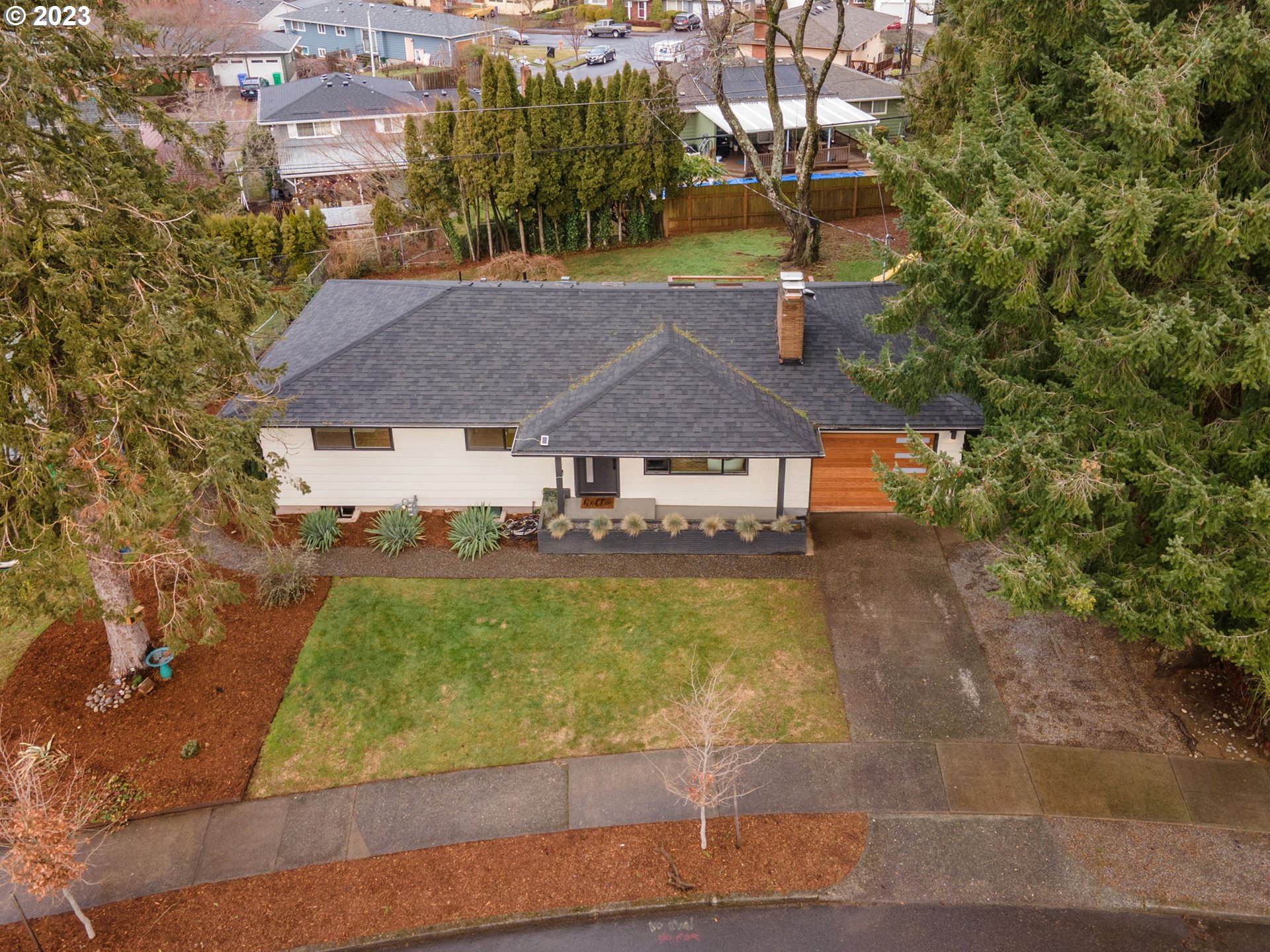 10303 Southeast Stephens Street Portland, OR 97216 - Photo 29 of 32 a view of a house with a yard