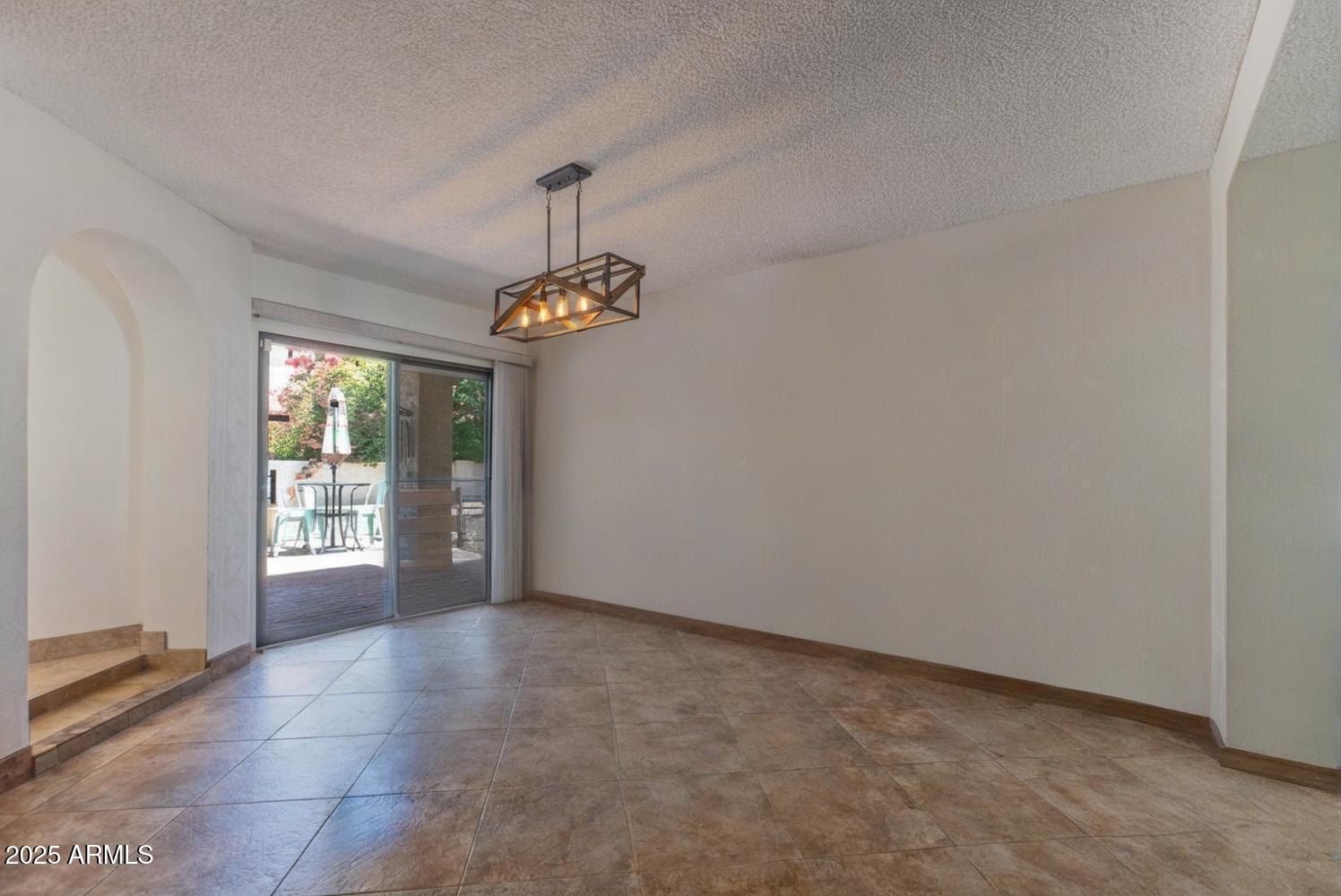 4714 East Ardmore Road Phoenix, AZ 85044 - Photo 14 of 28 Ardmore Rd dining room empty