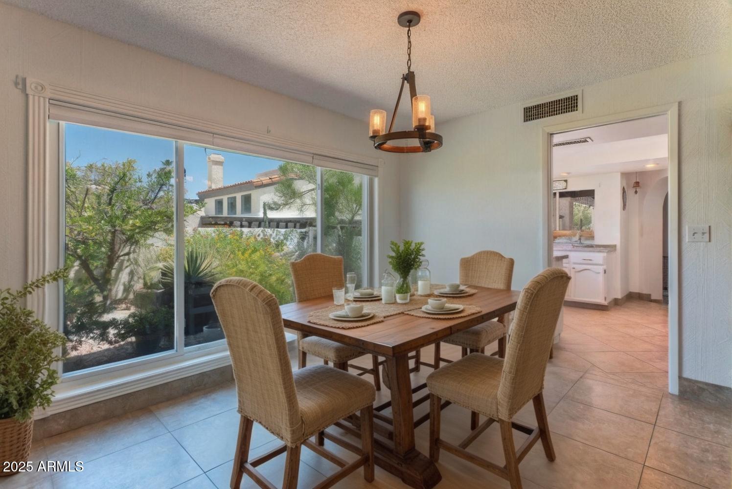 4714 East Ardmore Road Phoenix, AZ 85044 - Photo 15 of 28 Breakfast table virtual staged