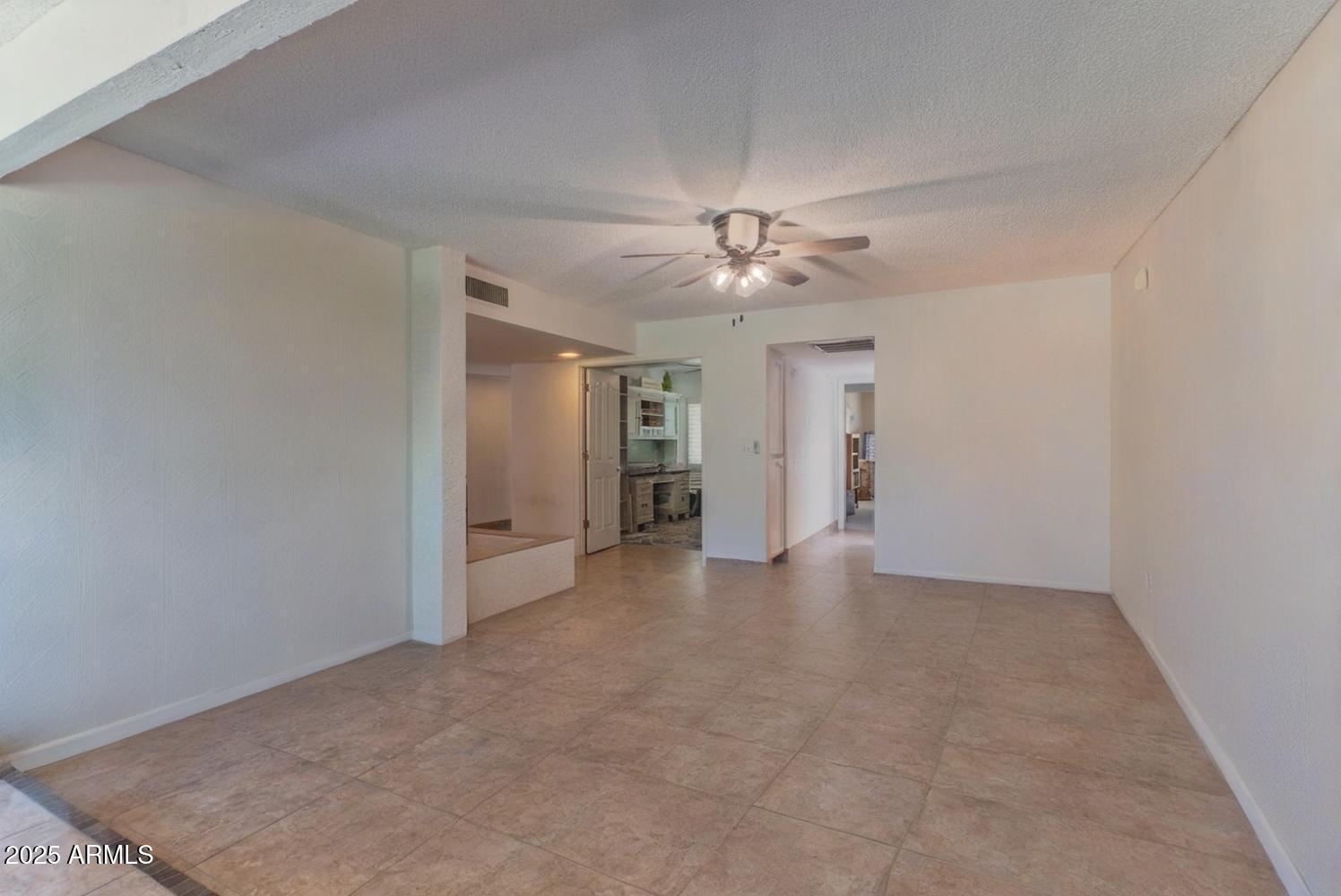 4714 East Ardmore Road Phoenix, AZ 85044 - Photo 7 of 28 Ardmore Rd living room empty