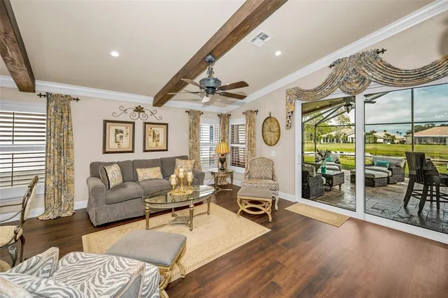 a kitchen with stainless steel appliances a refrigerator sink and cabinets