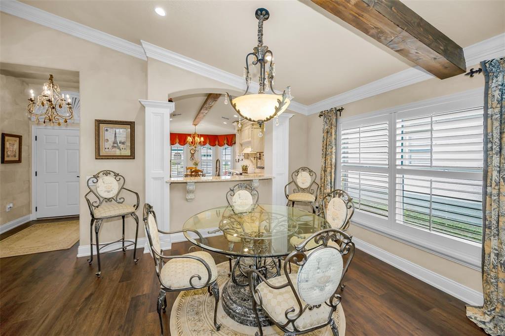 1326 Winding Willow Drive Trinity, FL 34655 - Photo 15 of 100 a view of a dining room with furniture window and wooden floor