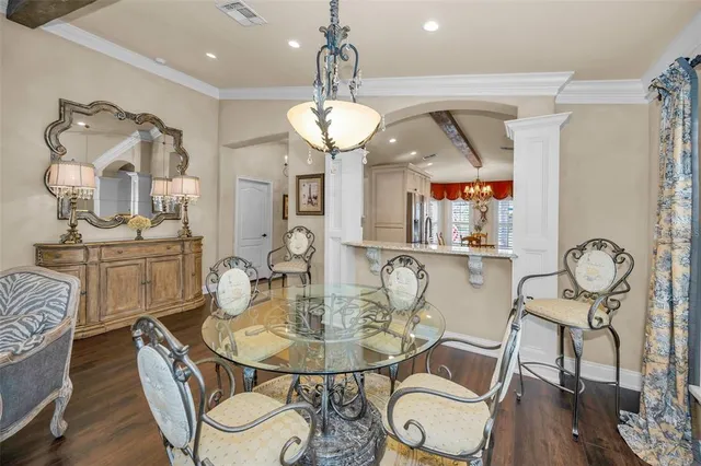 a bathroom with a granite countertop sink a large mirror and a shower