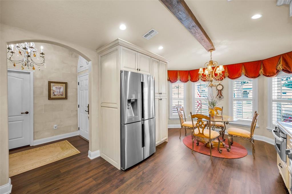 1326 Winding Willow Drive Trinity, FL 34655 - Photo 23 of 100 a view of a dining room with furniture window and wooden floor