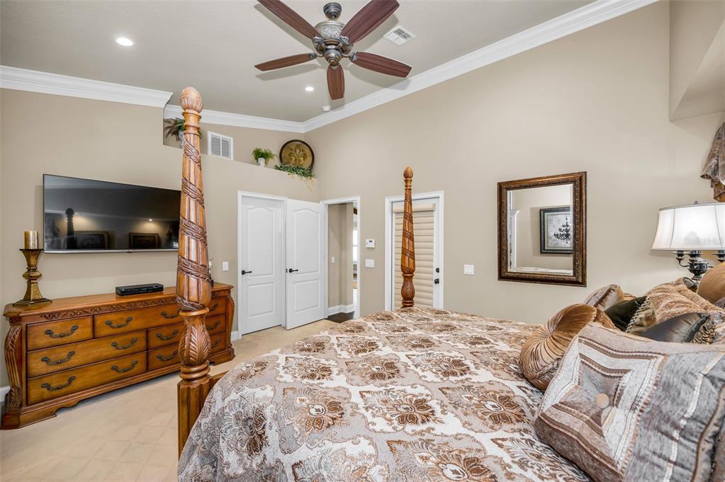 1326 Winding Willow Drive Trinity, FL 34655 - Photo 29 of 100 a bedroom with a bed and a flat screen tv