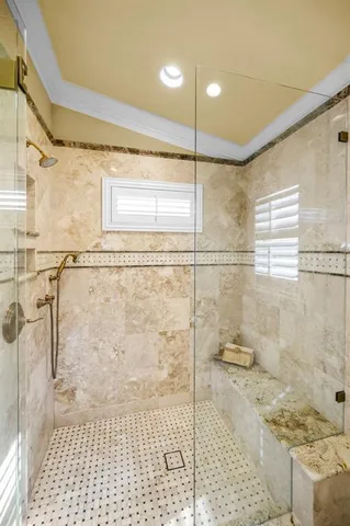 an aerial view of a house with a lake view