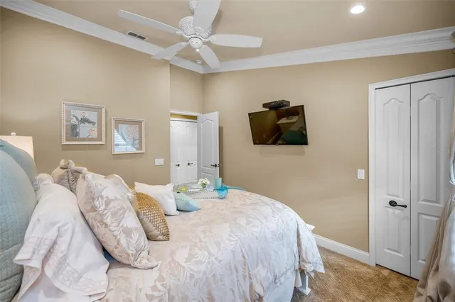 a view of a brick house with potted plants