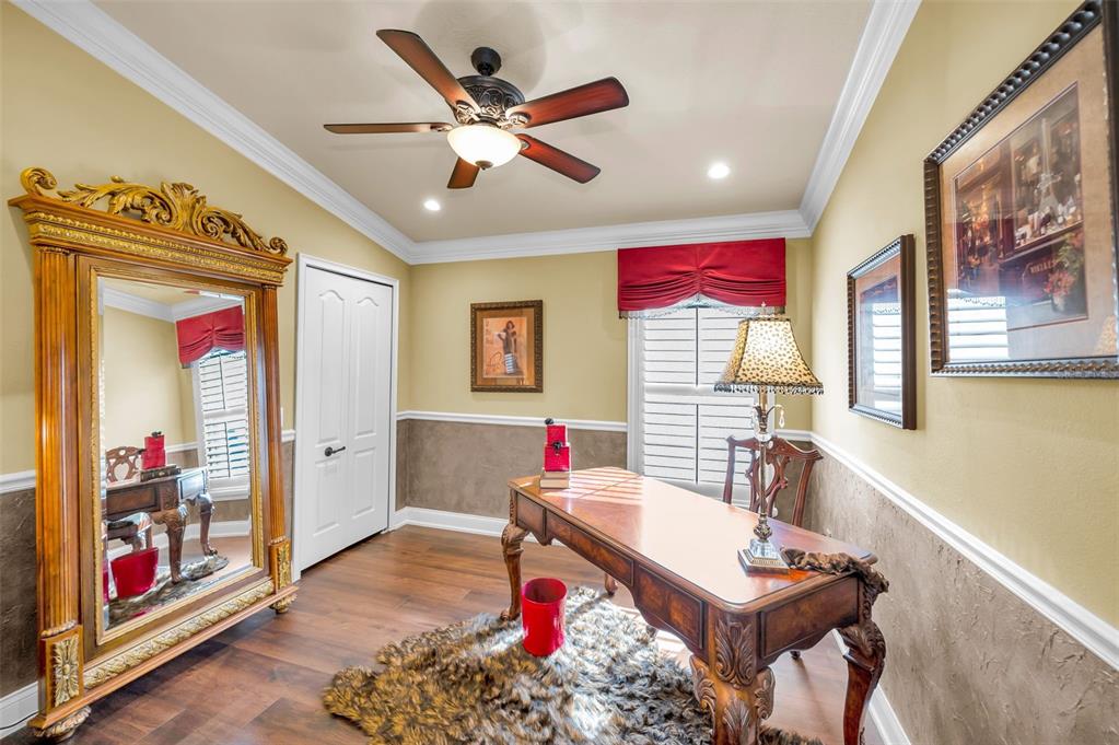 1326 Winding Willow Drive Trinity, FL 34655 - Photo 38 of 100 a living room with furniture and a flat screen tv