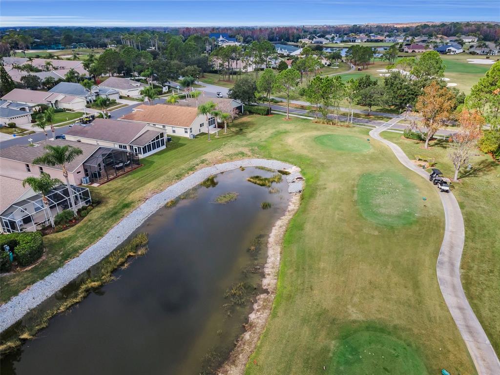 1326 Winding Willow Drive Trinity, FL 34655 - Photo 55 of 100 an aerial view of lake residential house with outdoor space