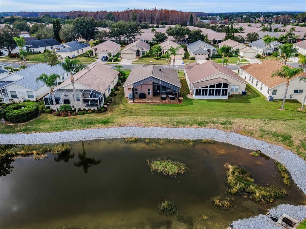 1326 Winding Willow Drive Trinity, FL 34655 - Photo 57 of 100 an aerial view of a house with a lake view