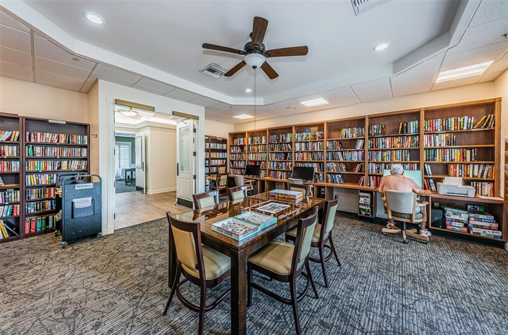 1326 Winding Willow Drive Trinity, FL 34655 - Photo 68 of 100 a dining room with furniture and wooden floor