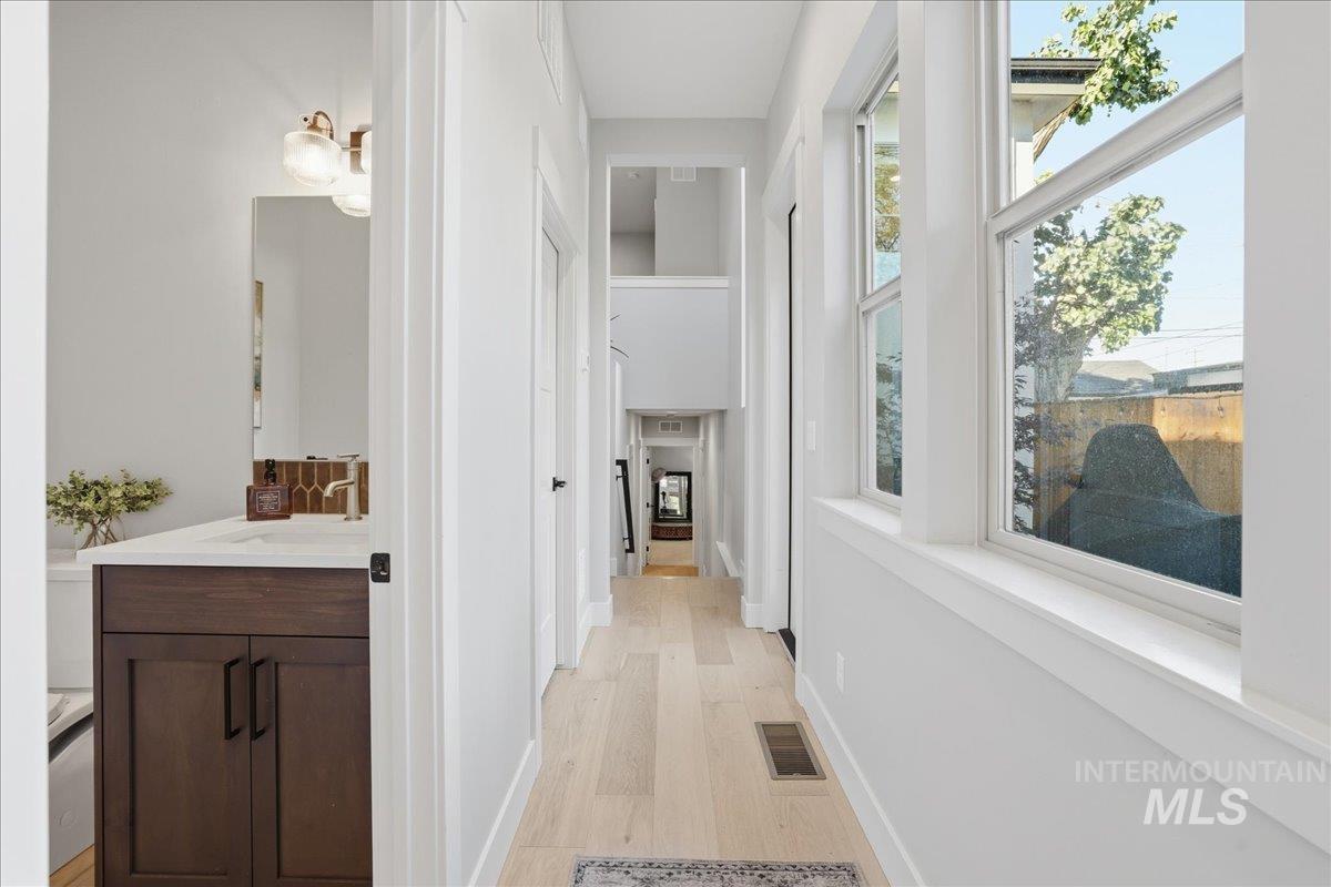 2129 North 34th Street Boise, ID 83703 - Photo 21 of 50 Corridor featuring light wood-type flooring and a sink