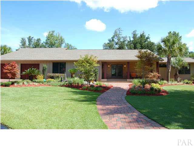 California Red Wood garage doors. Paver stone walkways. Anderson windows & doors. Home sits on 5.13 acres with wooded buffer on each side.