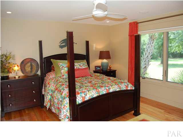 4380 Berryhill Road Pace, FL 32571 - Photo 13 of 24 2nd master. View of fountain, front & east garden area. 42" Plasma TV, phone & internet ready. Seperate hot water system.