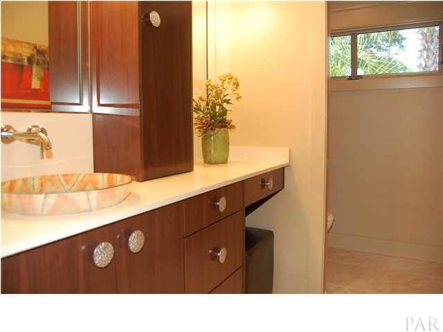 4380 Berryhill Road Pace, FL 32571 - Photo 14 of 24 2nd master bath. Granite countertops, glass bowl sink, Porcelain tile bath & closet, YLighting 14 Cubox wall sconce, Brizo faucets, 3 shower heads & Procher toilet.