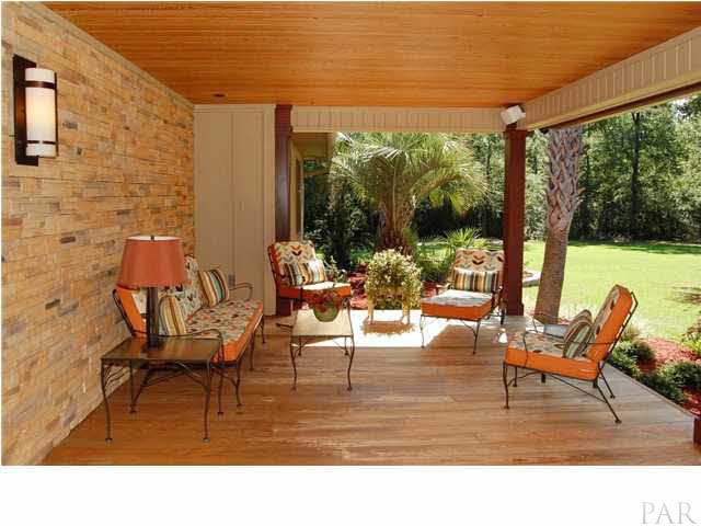 13 x 24 front porch. Pro Series sound throughout home, front porch & pool area. Grove White Cedar tongue & groove ceiling & floor. Dry stack ledge stone wall.