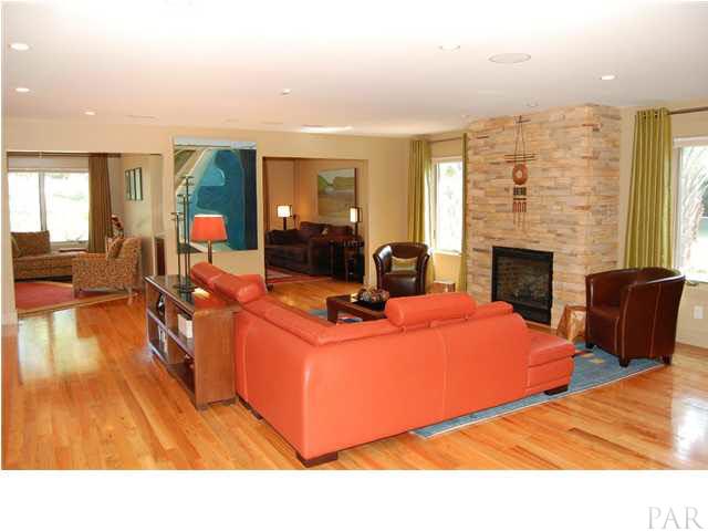 Red Oak hardwood flooring, Anderson casement windows, gas f/p with thermostat & blower. View of east garden & fountain.