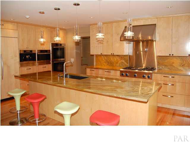 4380 Berryhill Road Pace, FL 32571 - Photo 8 of 24 Crystal Lace Pendants by Studio Design. Miele beverage center, Miele steam oven & Miele wall ovens w/warming drawer. Kitchen Aid built in fridge. 24" TV conveys.