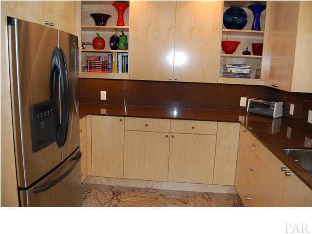 4380 Berryhill Road Pace, FL 32571 - Photo 10 of 24 Full bulter's pantry w/custom cabinets, granite tops, Rain Forrest Marble flooring, Miele dishwasher, Duet washer/dryer built in, microwave, wine cooler & Kenmore Elite fridge.