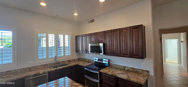 a view of a mirror of a room