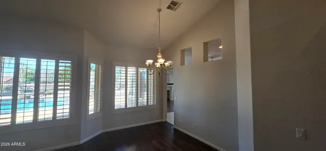 en empty room with windows