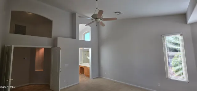 a kitchen with stainless steel appliances granite countertop a refrigerator a stove and a sink