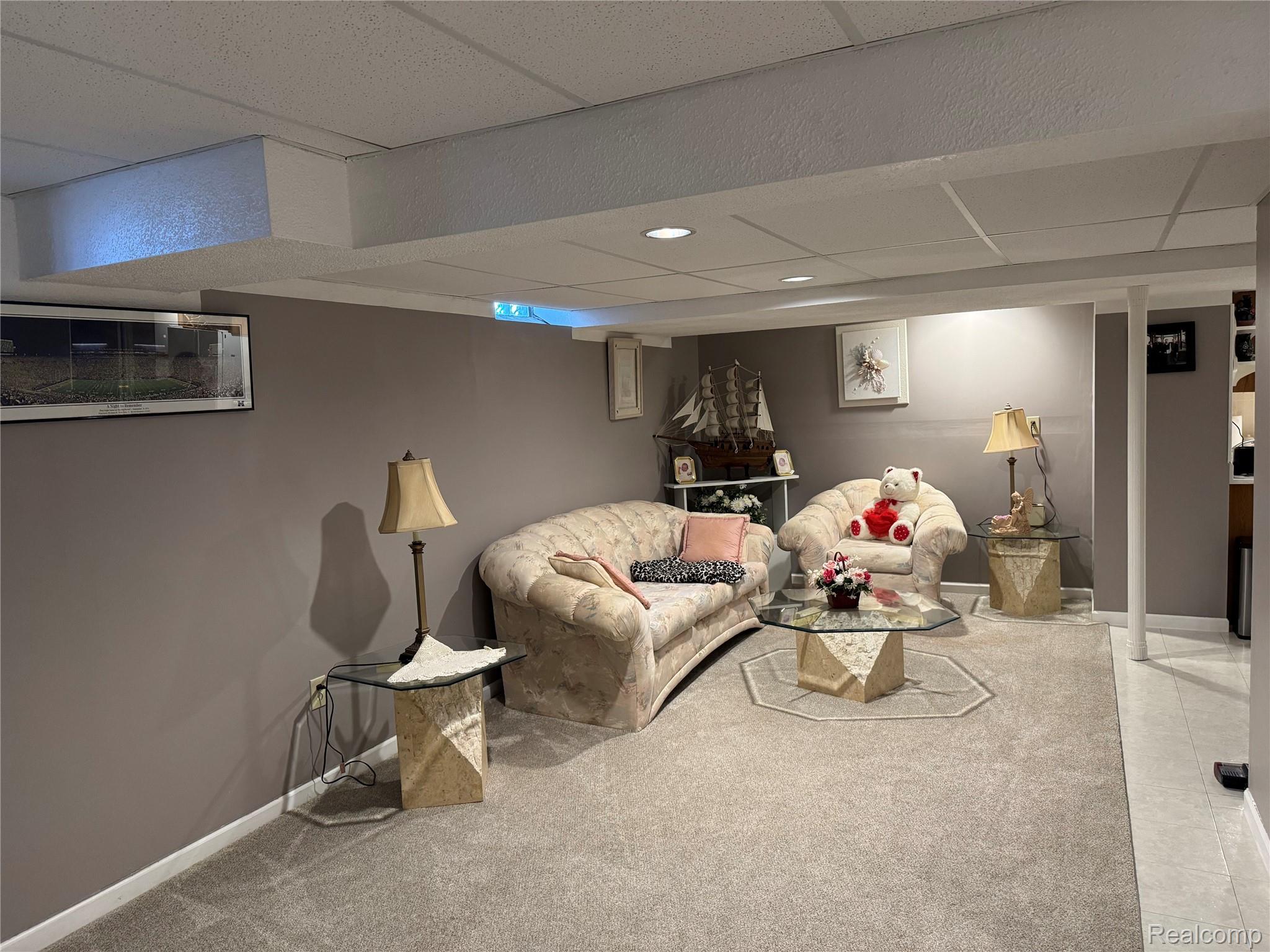48583 Tilch Road Macomb, MI 48044 - Photo 45 of 53 Living room with a paneled ceiling and carpet flooring