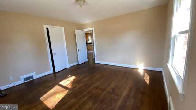 a view of an empty room and window