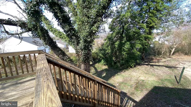 a view of balcony and yard