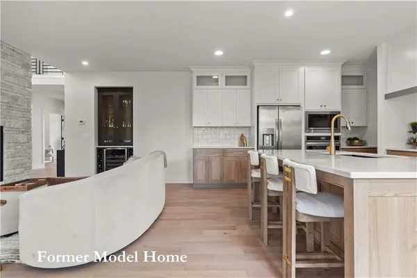 $859,911 | 2517 Northeast Woodland Court, Lee's Summit, MO 64086