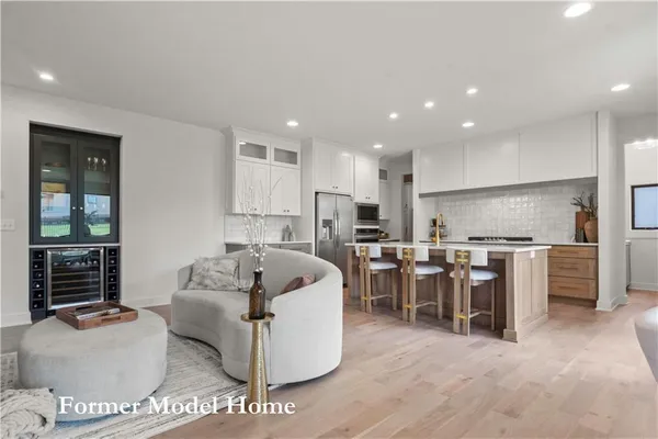 $859,911 | 2517 Northeast Woodland Court, Lee's Summit, MO 64086