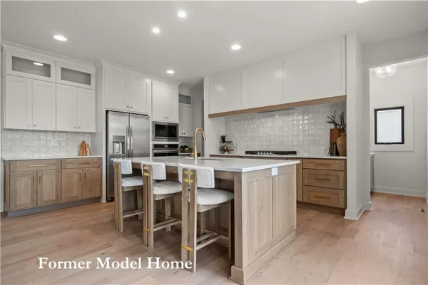 $859,911 | 2517 Northeast Woodland Court, Lee's Summit, MO 64086