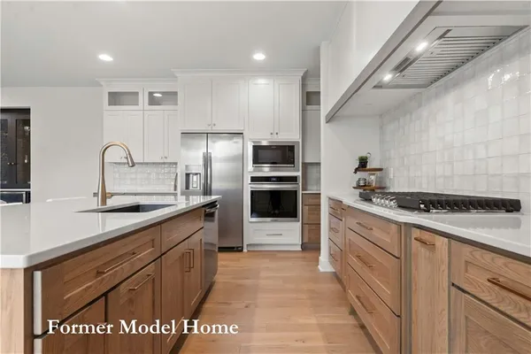 $859,911 | 2517 Northeast Woodland Court, Lee's Summit, MO 64086