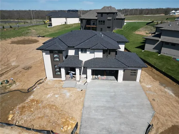 $859,911 | 2517 Northeast Woodland Court, Lee's Summit, MO 64086