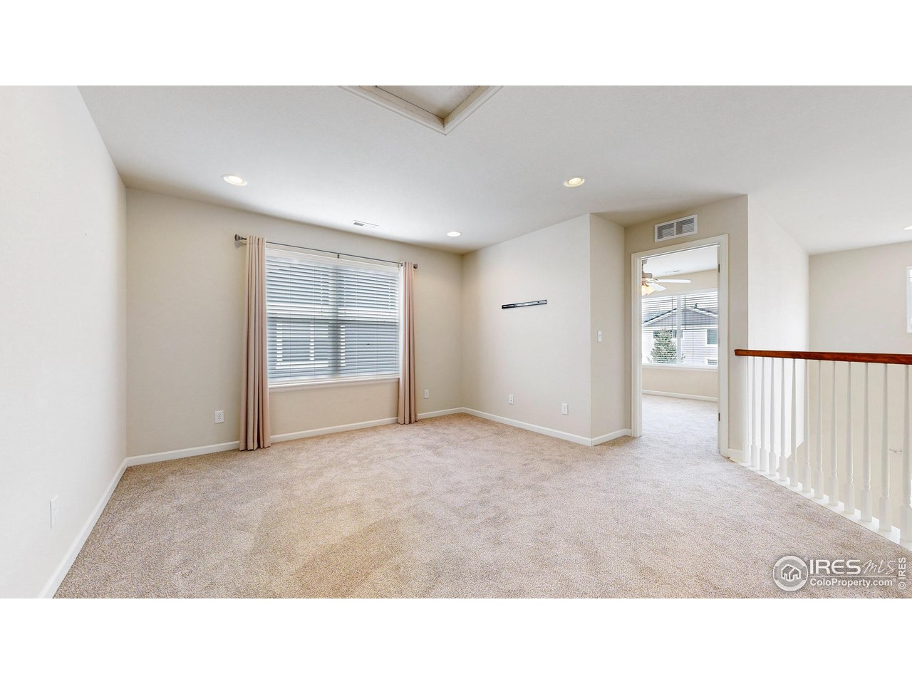 6748 Rainier Road Timnath, CO 80547 - Photo 19 of 34 a open hall with a window