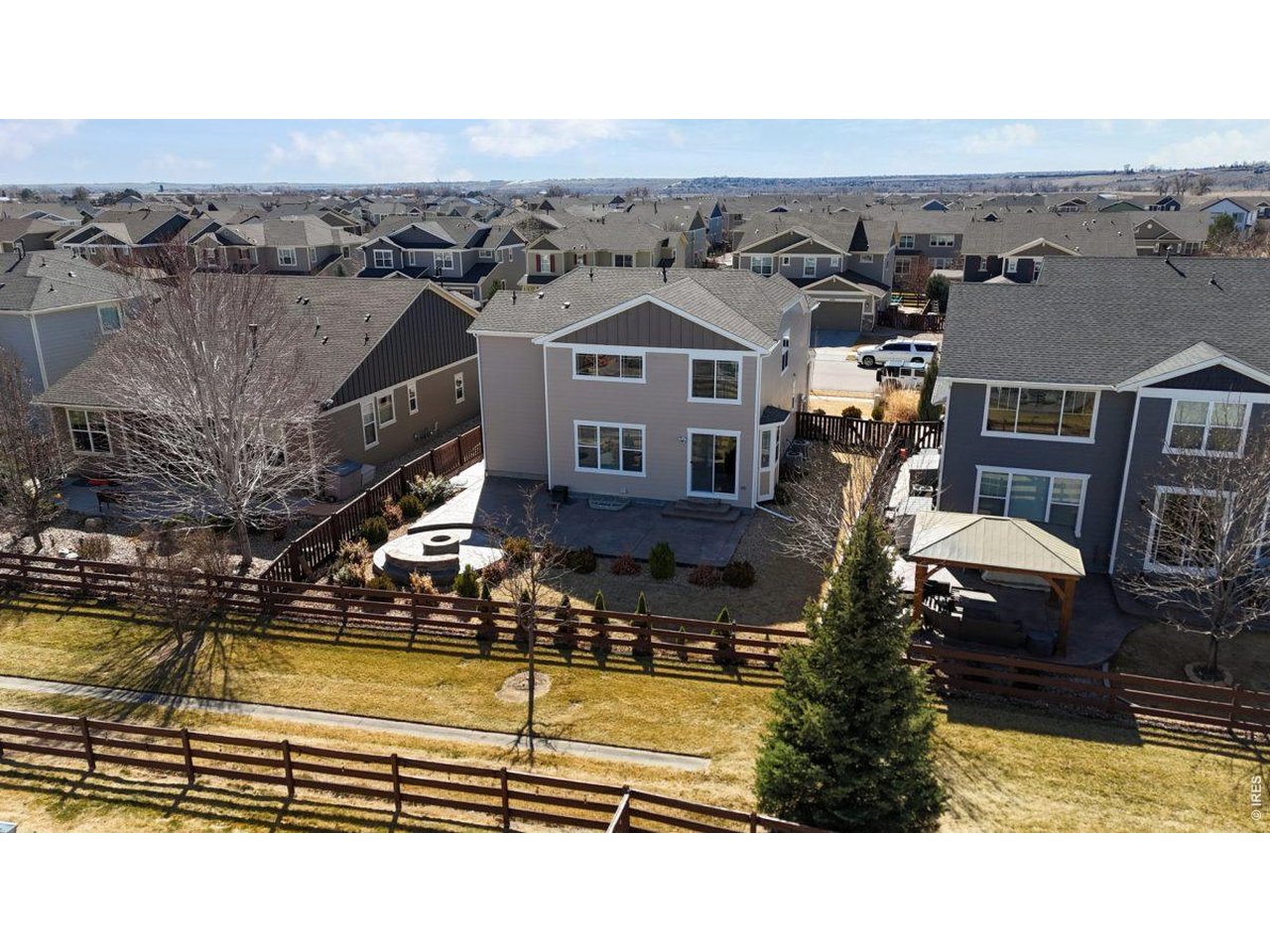 6748 Rainier Road Timnath, CO 80547 - Photo 2 of 34 a view of a swimming pool
