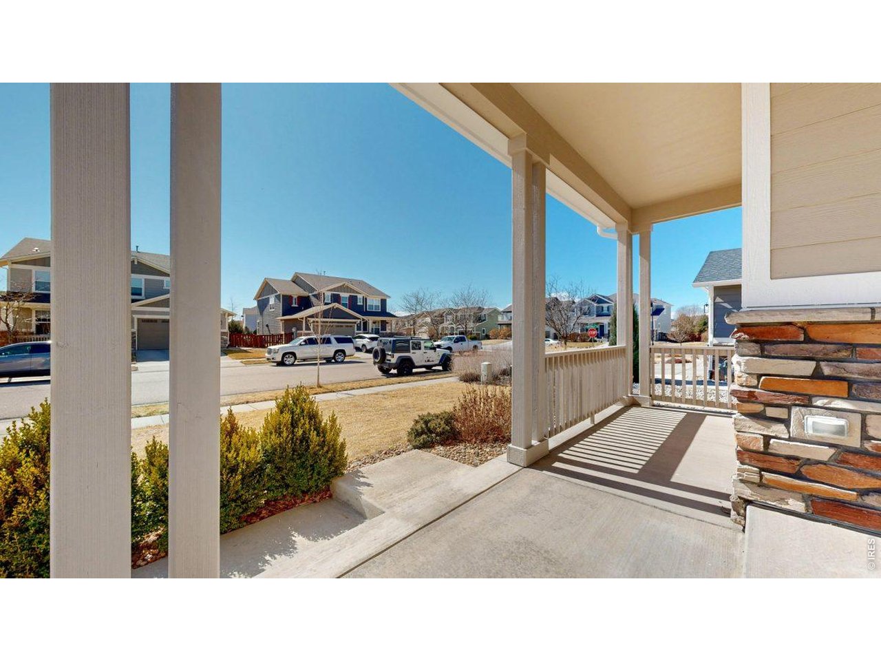 6748 Rainier Road Timnath, CO 80547 - Photo 31 of 34 a black and white photo of a living room