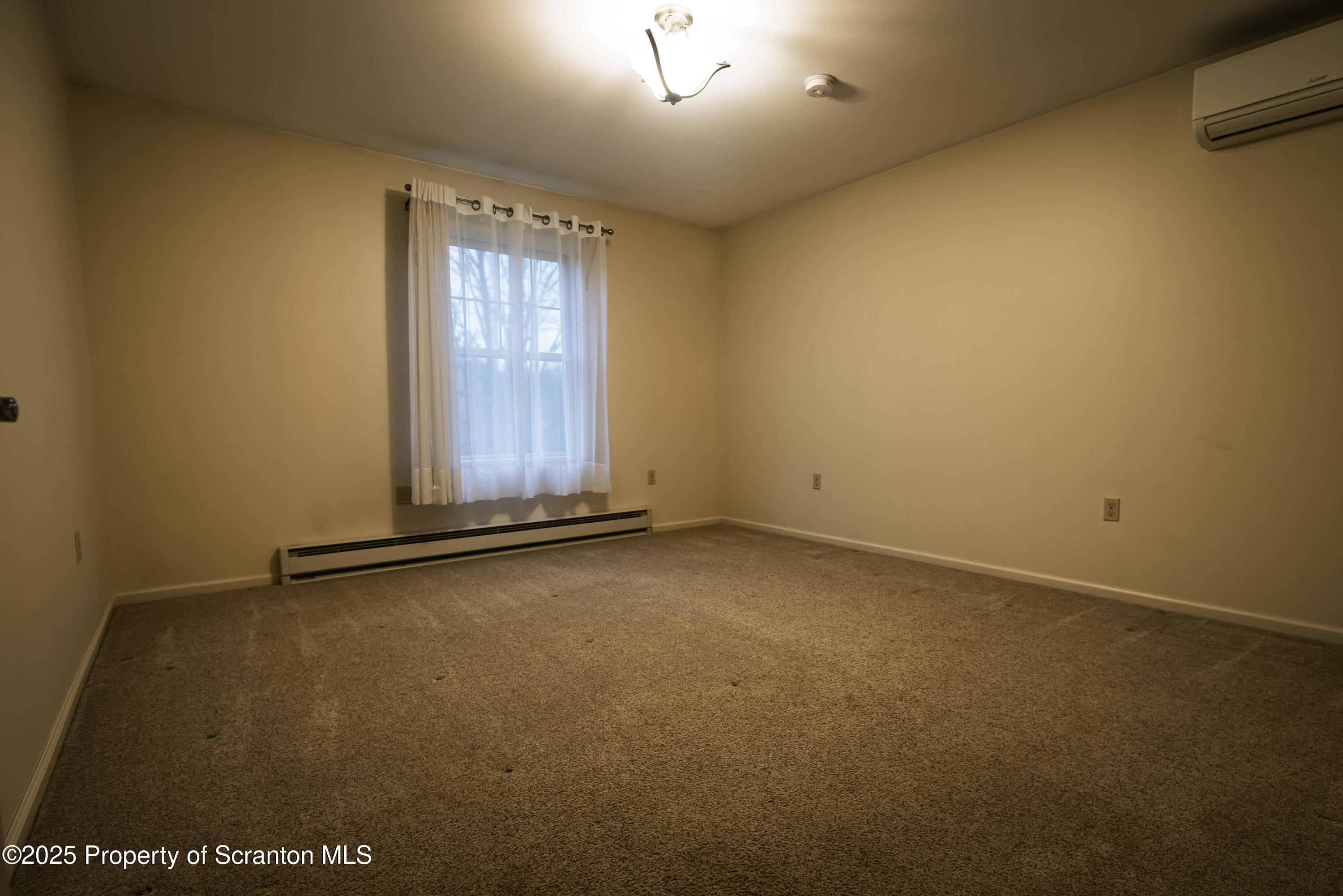 159 Vail Road Factoryville, PA 18419 - Photo 11 of 31 an empty room with windows