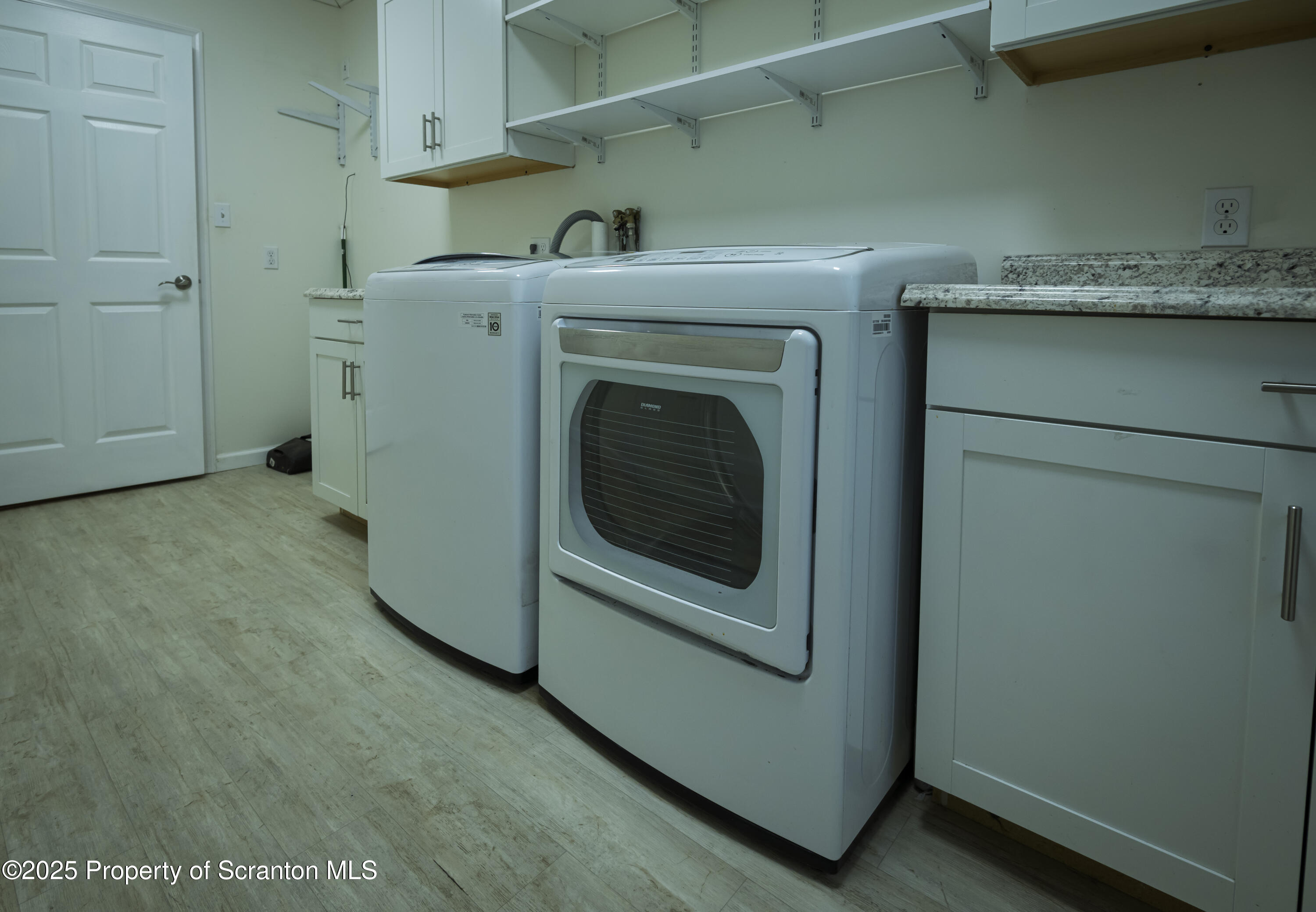 159 Vail Road Factoryville, PA 18419 - Photo 19 of 31 a utility room with dryer and washer