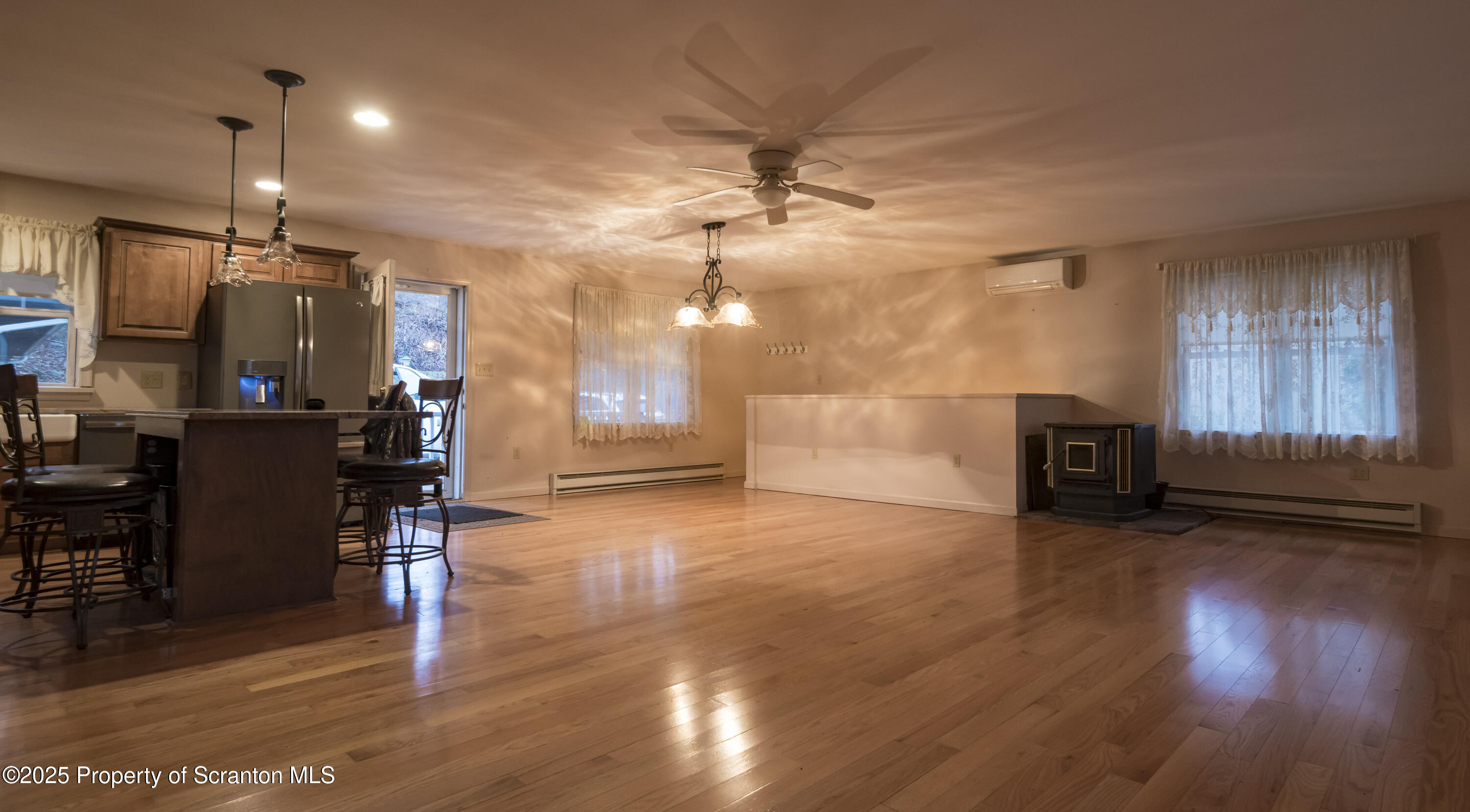 159 Vail Road Factoryville, PA 18419 - Photo 10 of 31 a view of a room with wooden floor kitchen view and a window