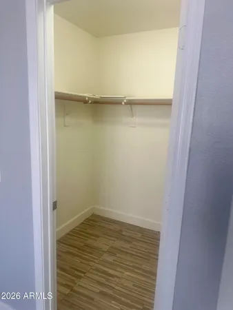 a view of an empty walk in closet