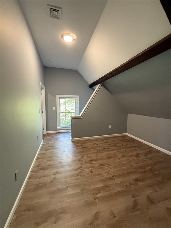 10 High Street, Unit 3 Andover, MA 01810 - Photo 12 of 16 a view of empty room with wooden floor