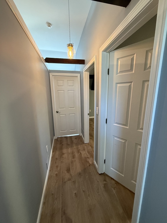 10 High Street, Unit 3 Andover, MA 01810 - Photo 13 of 16 a view of a hallway with wooden floor and a hallway