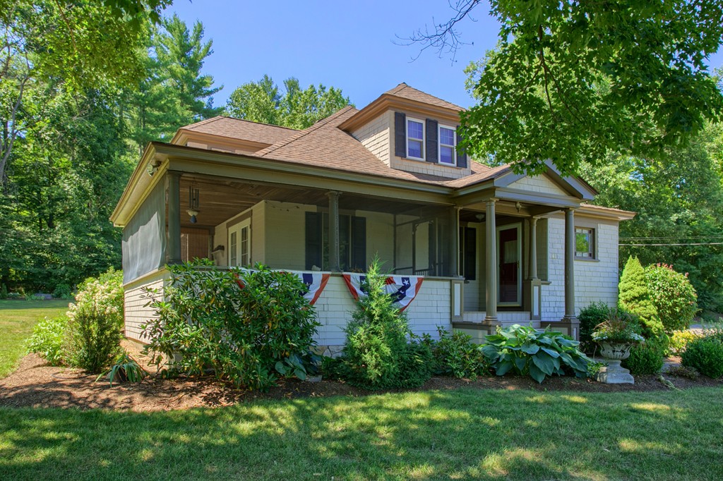 45 Hill Road Groton, MA 01450 - Photo 3 of 30 a front view of a house with a garden